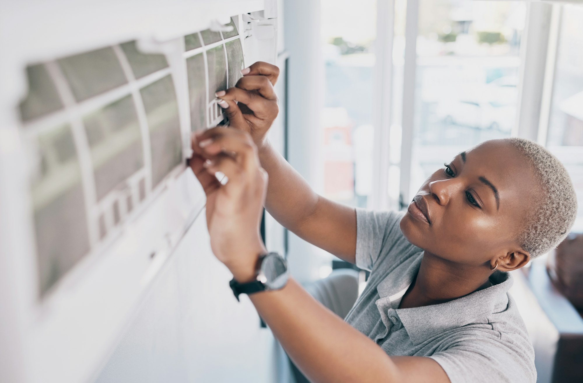 black-woman-electrician-and-ac-repair-for-electrical-system-fan-maintenance-and-labor-female-mec.jpg